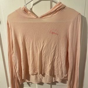 Light pink cropped long sleeve lightweight sweatshirt